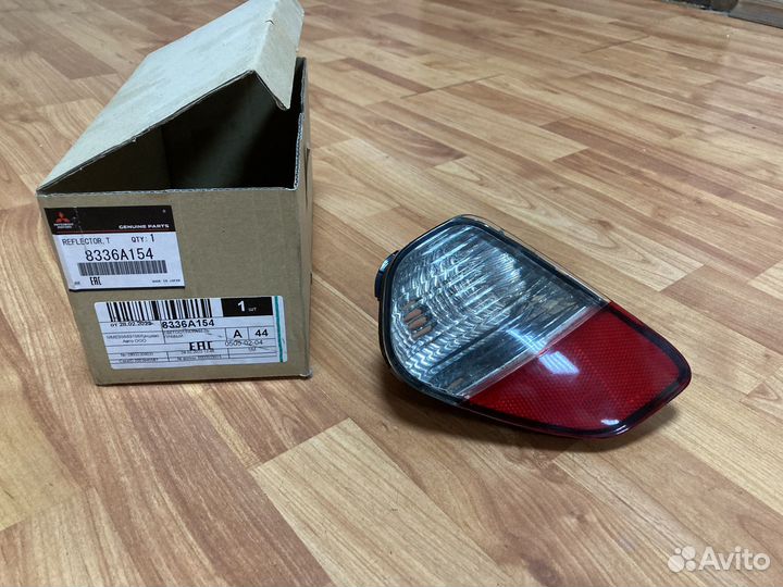 Фонарь заднего хода outlander