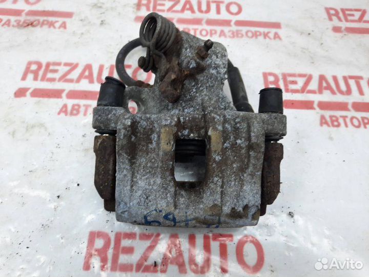 Суппорт тормозной задний левый Mazda Mazda3 BL