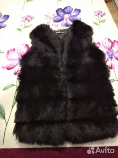 Меховая жилетка