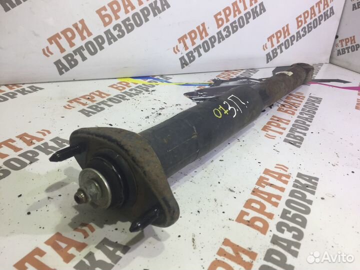 Мазда сх-7 Амортизатор задний правый