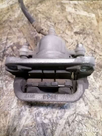 Суппорт тормозной задний Nissan Teana J32 4WD