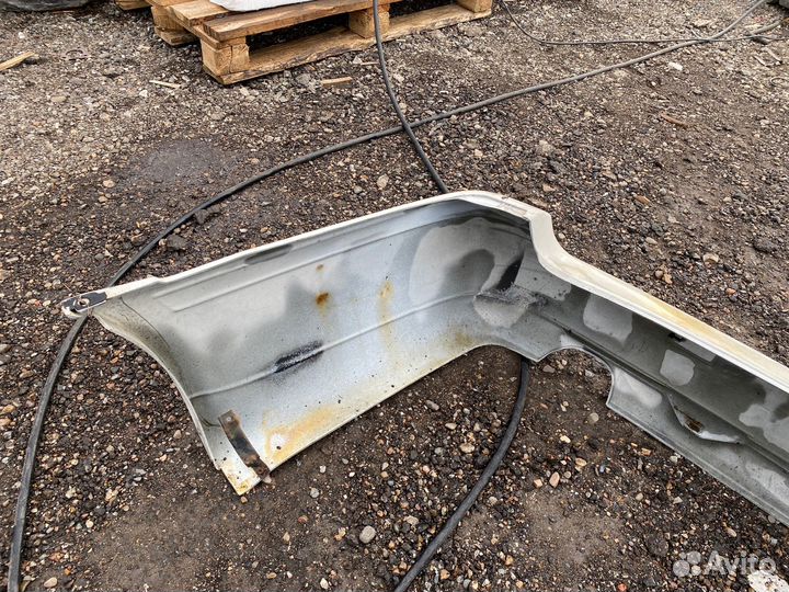 Бампер задний Nissan Primera 1993г