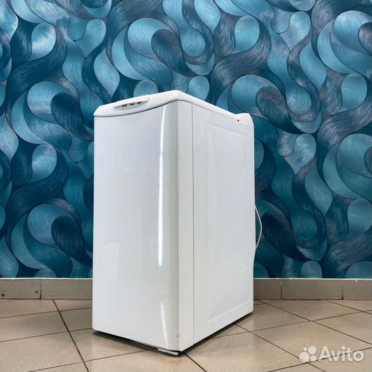 Стиральная машина с вертикальной загрузкой Bosch