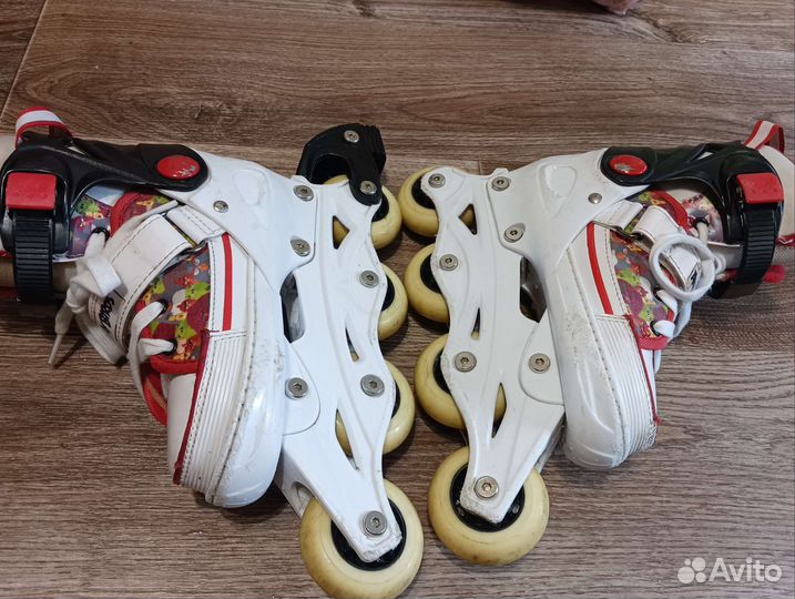 Роликовые коньки