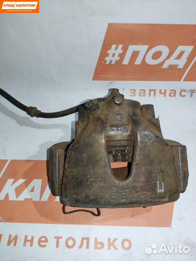 Суппорт тормозной передний правый Opel Astra H