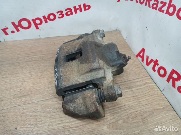 Передний левый суппорт Kia Spectra