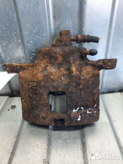 Суппорт тормозной передний правый Opel Frontera B
