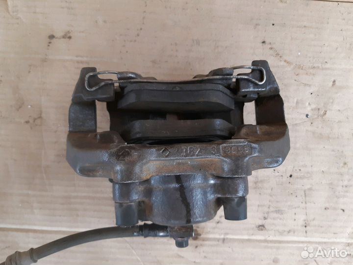 Суппорт передний. левый правый Опель Омега Б