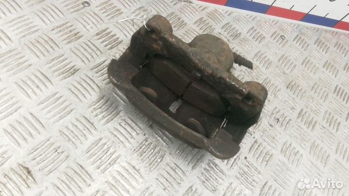 Суппорт передний правый Nissan X-Trail T31 2009