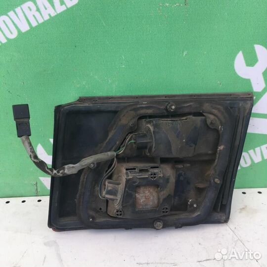 Фонарь задний внутренний левый Тойота Карина Е