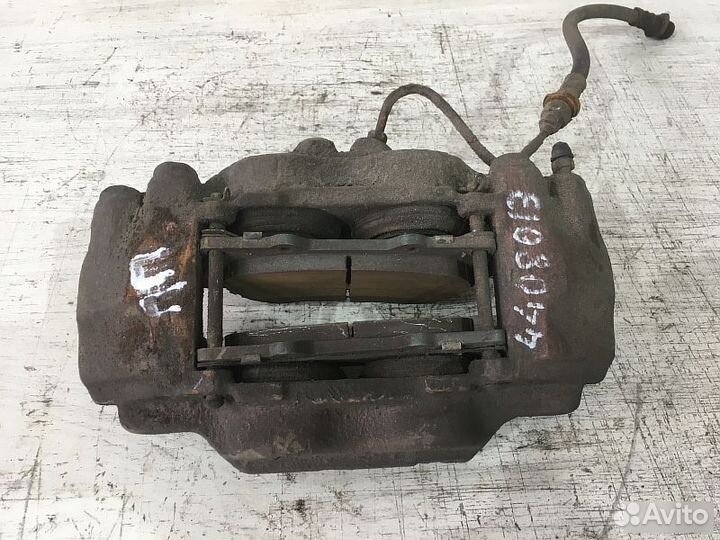 Суппорт передний лев Toyota Land Cruiser Prado 120