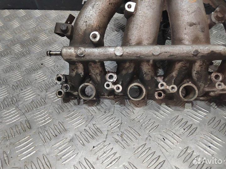 Впускной коллектор Mitsubishi Carisma 1.8
