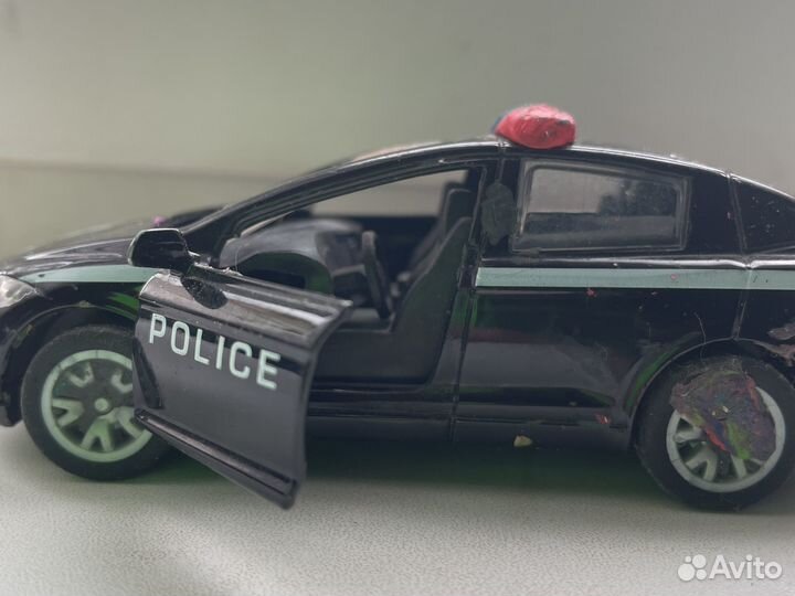 Полицейская машина игрушка