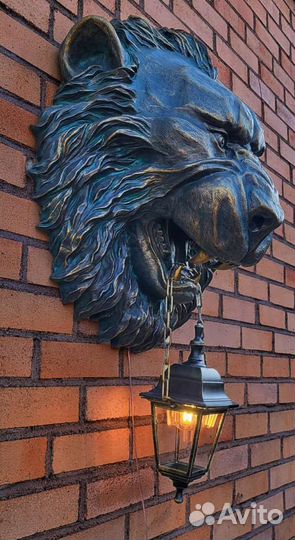 Барельеф голова льва