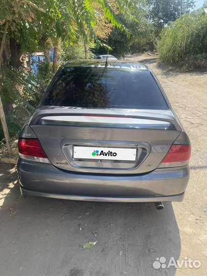 Mitsubishi Lancer 1.6 МТ, 2006, 266 000 км
