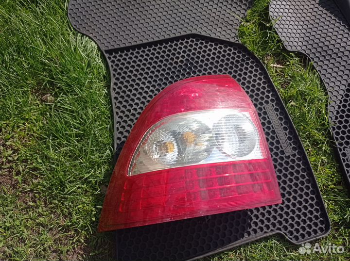 Стопарь задний на priora