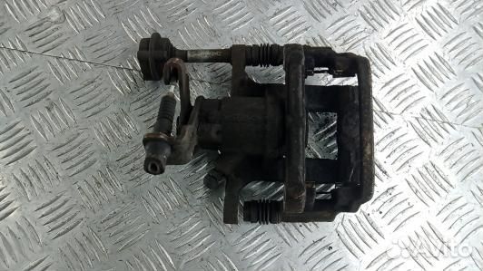 Суппорт тормозной задний правый opel astra J (PDN2