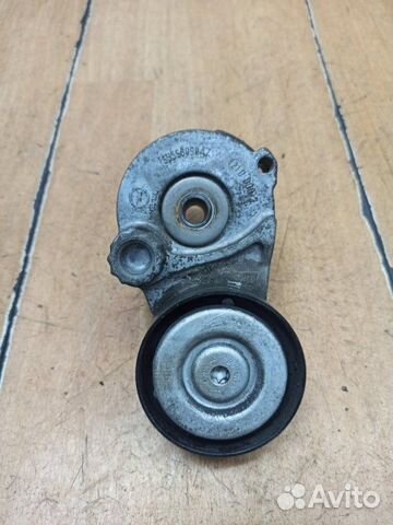 Натяжной ролик приводного ремня Opel Astra H