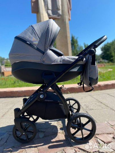 Коляска Tutis Nanni 2в1серый /т.серый кожа/чер.рам