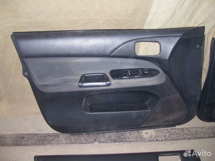 Митсубиси ланцер 9 обшивка двери
