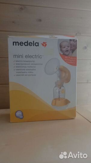 Молокоотсос medela электрический
