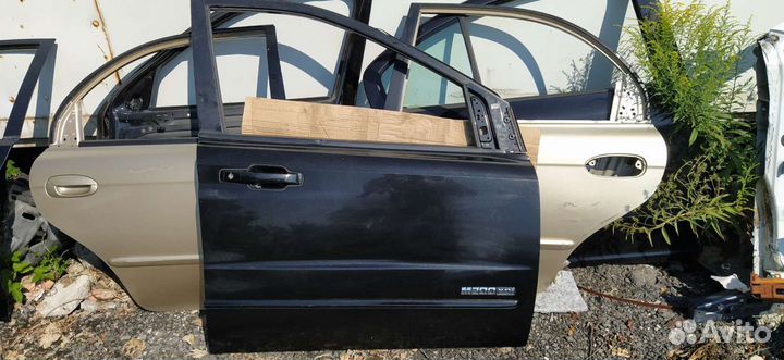 Дверь правая Санг Енг Кайрон (Ssang Yeng) разборка