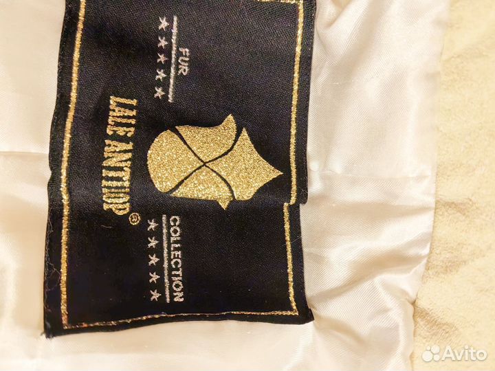 Жилетка меховая женская