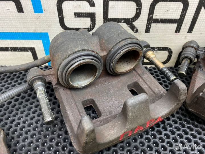 Суппорта передние Subaru Forester SG5 EJ203 2.0