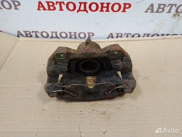 Суппорт тормозной передний левый Opel Zafira A