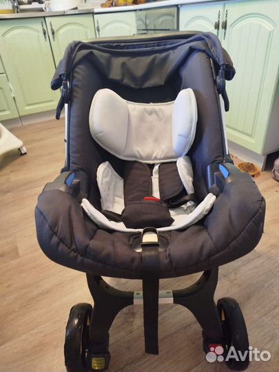 Детское автокресло-коляска