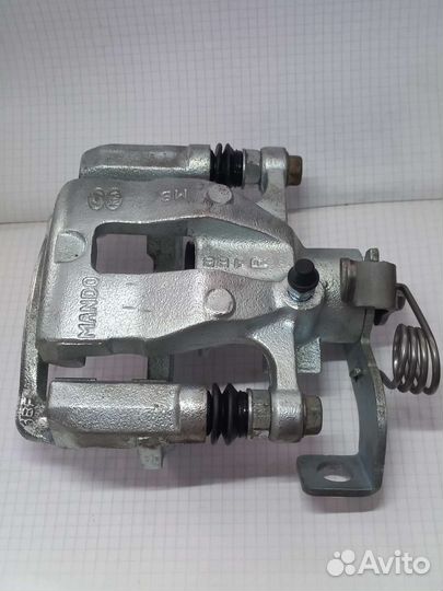 Задние тормозные суппорта Kia Rio 3