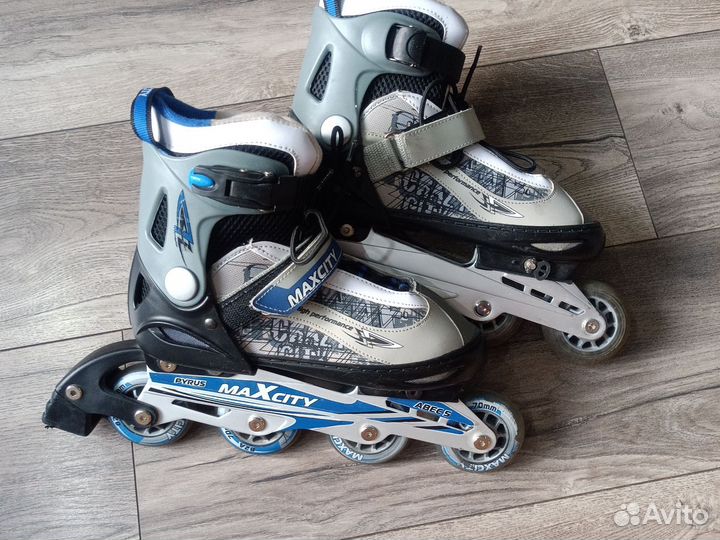 Роликовые коньки