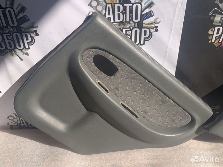Kia spectra дверные карты задние
