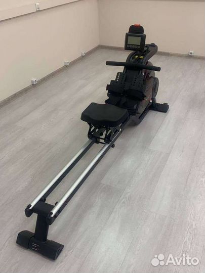 Гребной тренажер