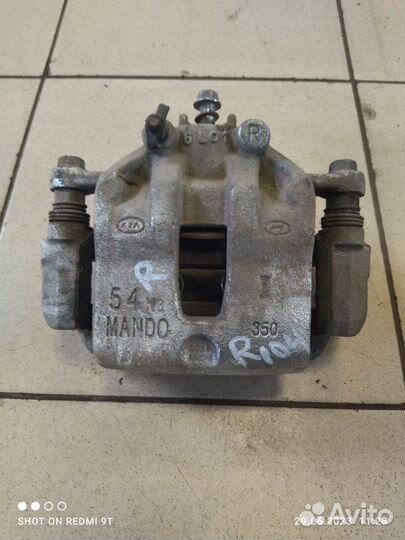 Суппорт тормозной передний правый Kia Rio 4