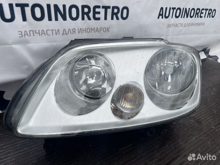Фара левая Volkswagen Kaddy