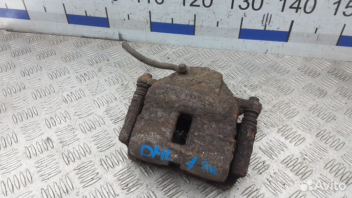 Суппорт передний левый Nissan Almera N16 рест