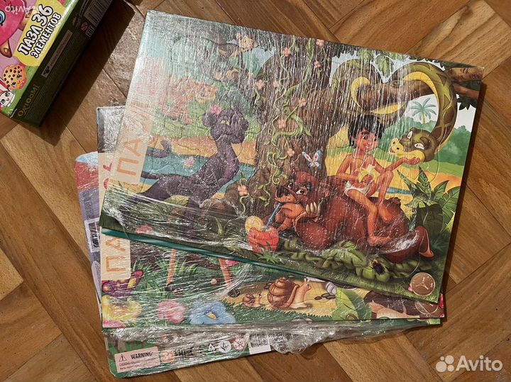 Пазлы разные наборами, много