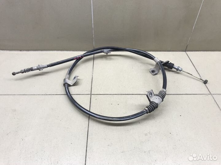 Трос стояночного тормоза левый Outlander (GF) 2012