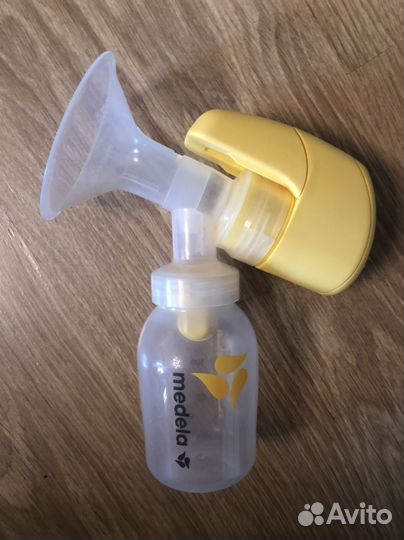 Молокоотсос medela электрический