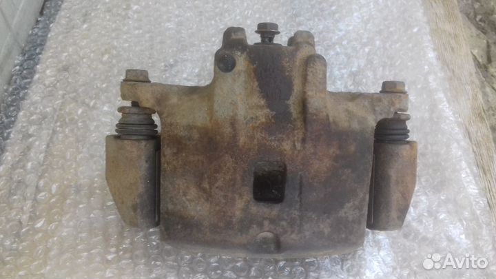 Митсубиси Лансер 9 передней правый суппорт