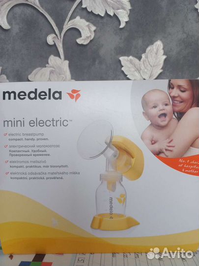 Молокоотсос medela электрический