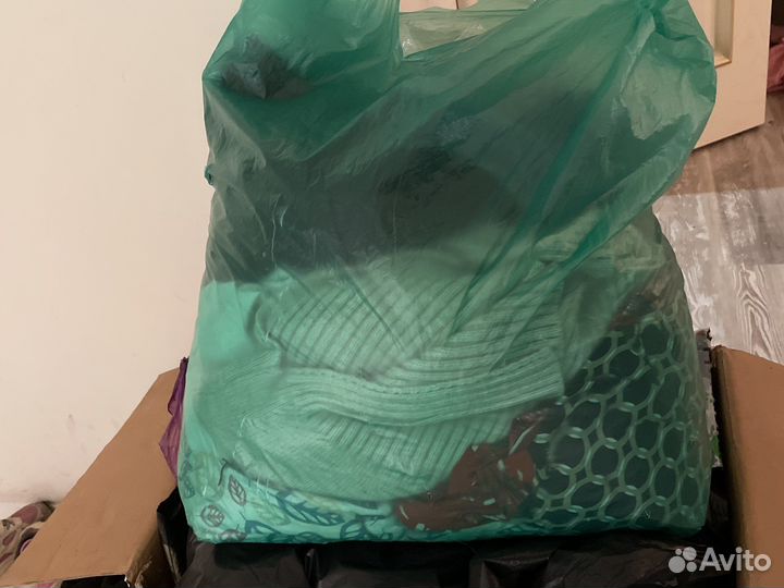 Вещи на покрытых пакетом