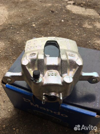 Суппорт передний левый solaris