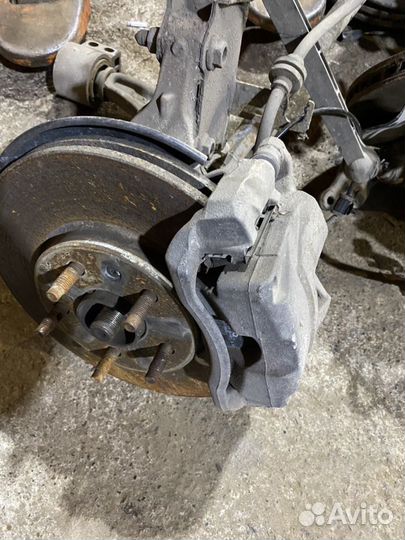 Chevrolet Cruze супорт передний правый