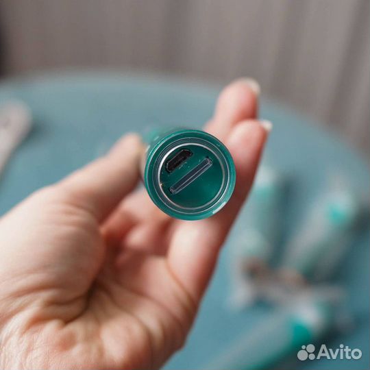 Электрическая зубная щетка