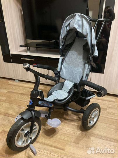 Трехколесный велосипед с родительской ручкой