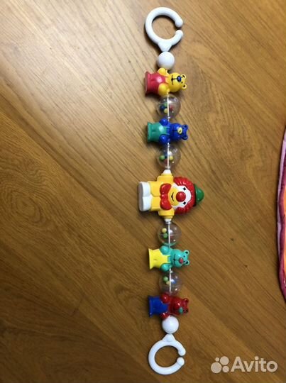 Подвеска погремушка в коляску