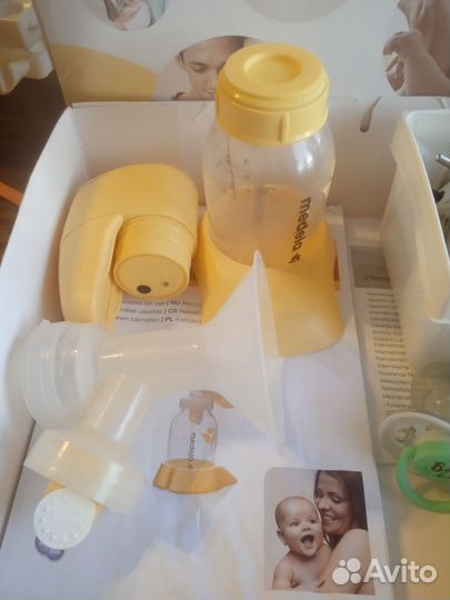 Молокоотсос medela электрический