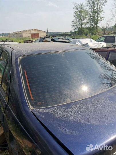 Стекло заднее Nissan almera N15